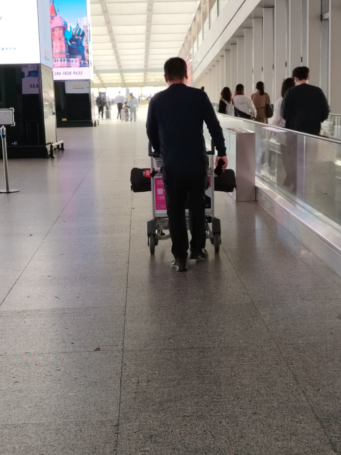 Continue walking inside Beijing airport