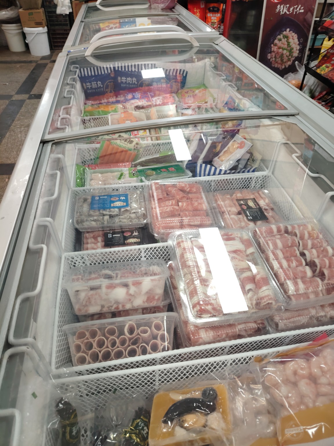 Cooked food section in a Beijing local market